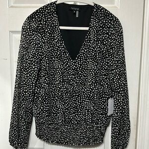 Black with white polkadot shirt